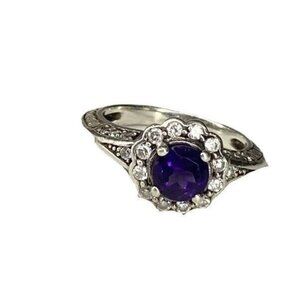 Purple Amethyst? Solitaire clear stones surround Marked 925 silver ring Size 7.5